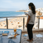 Algarve property owner on terrace overlooking beach